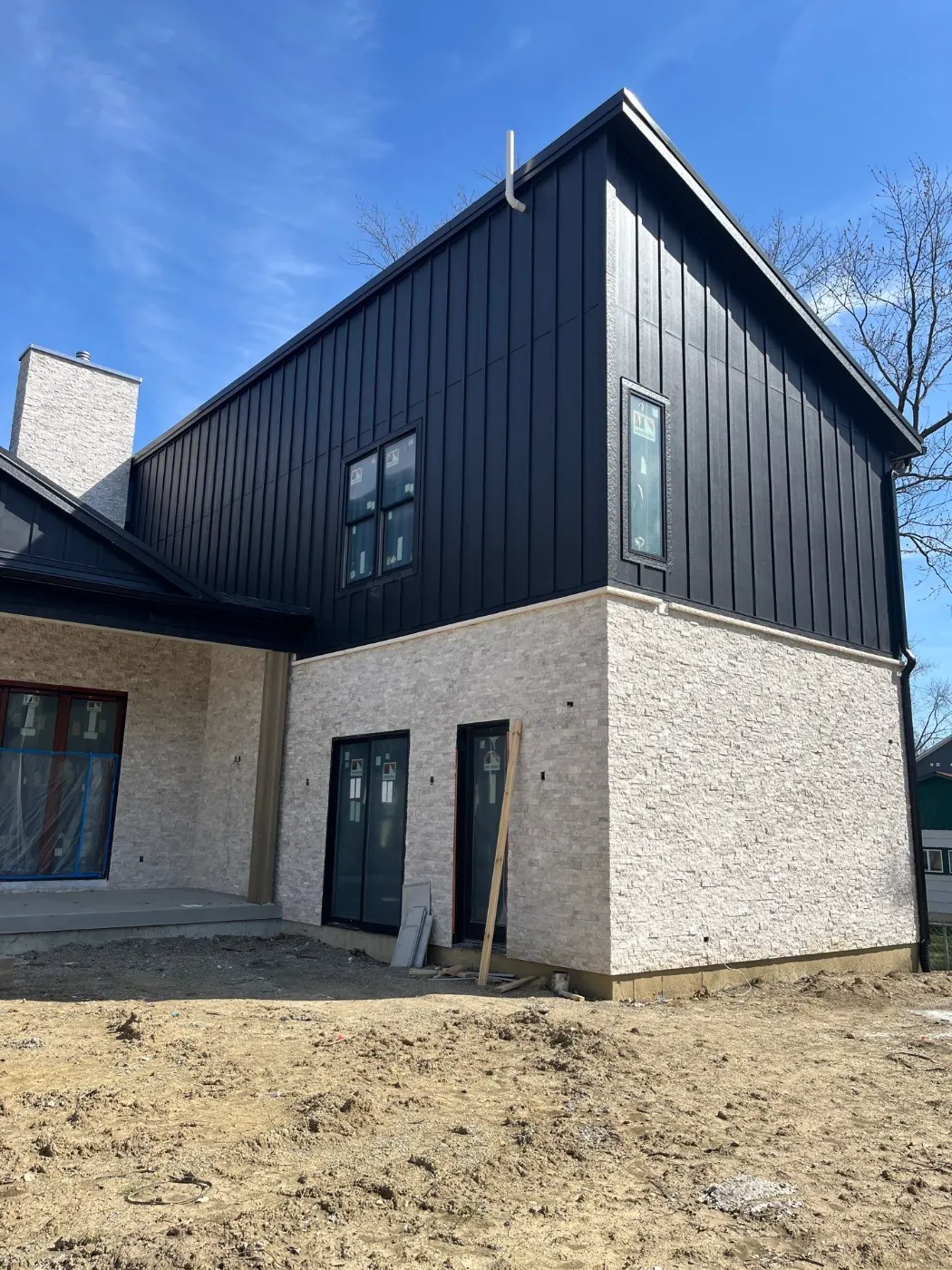 Tarping and dry-in on a Imperial Hills commercial roof